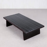 Black wooden table on a light gray background