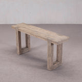 Wooden bench with rustic design on a plain floor and wall background