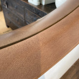 Close-up of a wooden surface with a blurred background