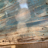 Close-up of a wooden surface with blue and brown discoloration