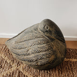 Carved stone bird