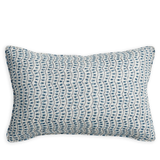 Decorative pillow with blue and white pattern on a white background