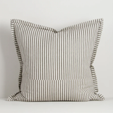 Striped pillow on a plain background