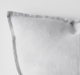 Gray textured pillow on a light gray background
