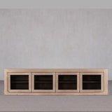 Long wooden cabinet with four glass doors on a gray background