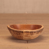 Antique wooden bowl with a natural finish, displayed against a neutral background.
