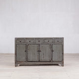 Vintage-style wooden cabinet with a distressed finish on a white background