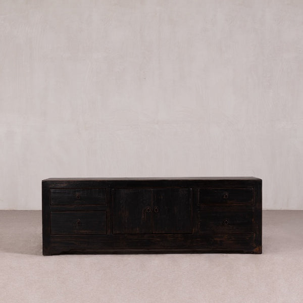 Low Sideboard with 2 doors and 4 drawers in a Black Rustic Finish.