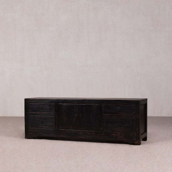 Low Sideboard with 2 doors and 4 drawers in a Black Rustic Finish.