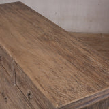 Natural Cabinet with three drawers and two doors.