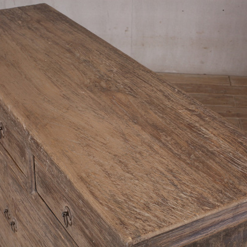 Natural Cabinet with three drawers and two doors.