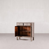 grey cabinet with two drawers and two doors