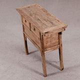 Wooden side table with two drawers on a gray background