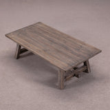 Wooden table with a rustic design on a plain background