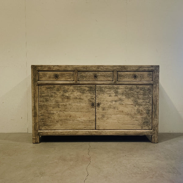 Natural Cabinet with three drawers and two doors.