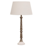 A white and natural wood floor lamp base without a lampshade.