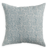 Decorative pillow with blue floral pattern on a white background