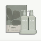 Two bottles of 'alive' skincare products with a box featuring a leaf design on a white background.