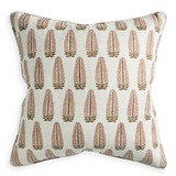 Decorative pillow with a leaf pattern on a light background
