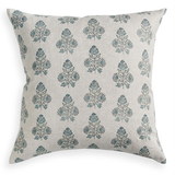A square throw pillow featuring a repeating blue-gray botanical damask pattern on a textured off-white linen background.