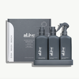 Set of 'alive' cleaning products including bottles and a book on a white background